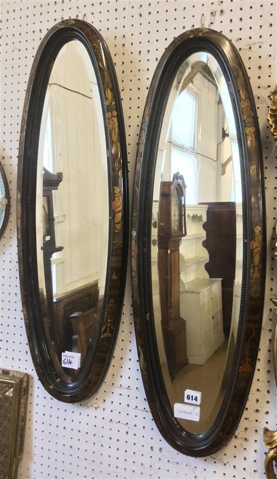 2 oval Chinese mirrors